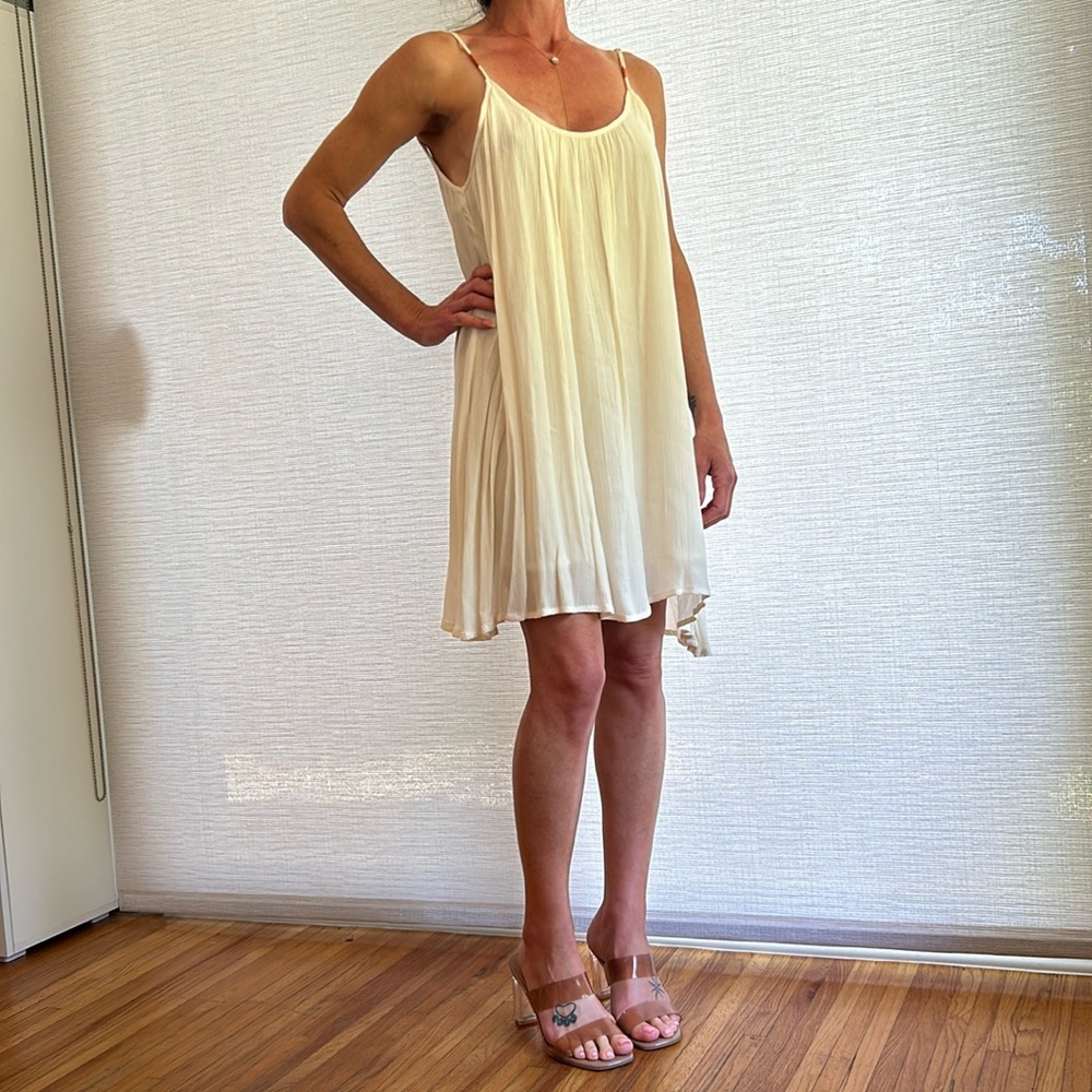 cream flowy beach mini dress or can be used as a cover-up. S